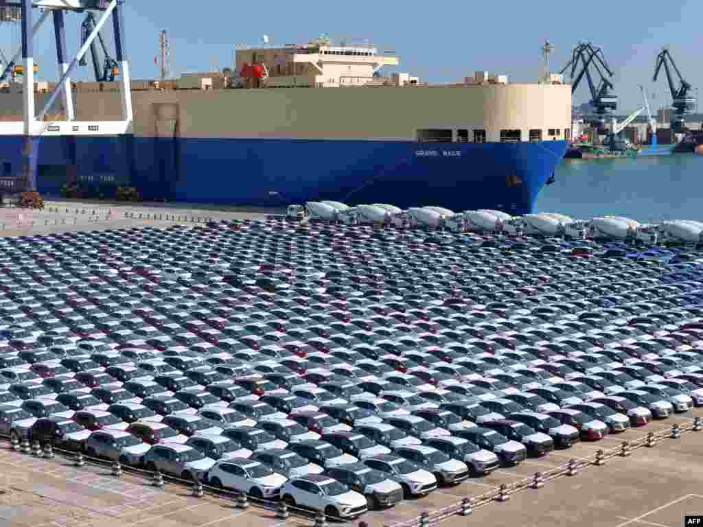 Cars for export are seen at a port in Yantai, China&#39;s eastern province of Shandong. (Photo by AFP) / China OUT