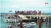 Los martes y los jueves son los días designados para transportar a migrantes entre los diferentes puertos. Las imágenes contrastan con los botes de turistas que llegan los fines de semana a disfrutar de un día de sol en las playas Capurganá.