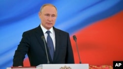 Vladimir Putin pada upacara pengambilan sumpah jabatannya sebagai Presiden Rusia untuk masa jabatan keempat di Istana Grand Kremlin, Moskow, Rusia, 7 Mei 2018. 
