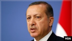 PM Turki, Tayyip Erdogan menyerukan agar Presiden Suriah Bashar al-Assad meletakkan jabatan.