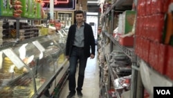 Los Angeles grocer Todd Khodadadi voices support for the protesters in Iran. 