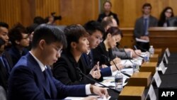 美國國會的行政委員會上，香港人士針對中國的發言。