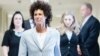 Andrea Constand walks to the courtroom during Bill Cosby's sexual assault trial at the Montgomery County Courthouse in Norristown, Pennsylvania, June 6, 2017. 