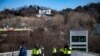 South Korea's impeached president resists arrest over martial law bid