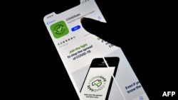 A photo illustration shows a new COVIDSafe app by the Australian government as seen on an Iphone to install in Sydney on April 27, 2020. - More than one million Australians have downloaded a new government smartphone app designed to make coronavirus…