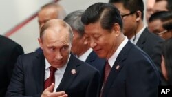 Vladimir Putin, Shi Zinpin Osiyoda Ihamkorlik va ishonch choralari kengashi sammitida.