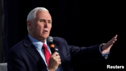 Mantan Wakil Presiden AS Mike Pence berbicara dalam sebuah acara di Washington, pada 31 Maret 2023. (Reuters/Kevin Lamarque)