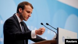 FILE - French President Emmanuel Macron speaks during the COP23 U.N. Climate Change Conference in Bonn, Germany, Nov. 15, 2017.