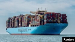 FILE - Container vessel Maersk Hangzhou sails in the Wielingen channel, Westerschelde, Netherlands, on July 15, 2018. Maersk and other shippers say the industry, which handles 90% of global trade, faces the possibility of significant disruptions around the world in 2024.