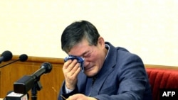 This picture released from North Korea's official Korean Central News Agency (KCNA) shows Kim Dong-Chul, a Korean-American as he addresses a news conference in Pyongyang, March 25, 2016. 