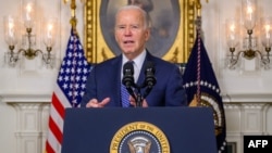 US President Joe Biden answers questions about Israel after speaking about the Special Counsel report in the Diplomatic Reception Room of the White House in Washington, DC, on February 8, 2024 in a surprise last-minute addition to his schedule for the day