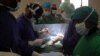 The surgeons at St. Elizabeth's cardiac care center perform difficult procedures at a facility in the middle of remote Cameroon. (Photo by Eugene Nforngwa)