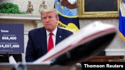El presidente Trump en la Sala Oval, donde se reunió con el gobernador de Texas, Greg Abbott, el jueves 7 de mayo de 2020.