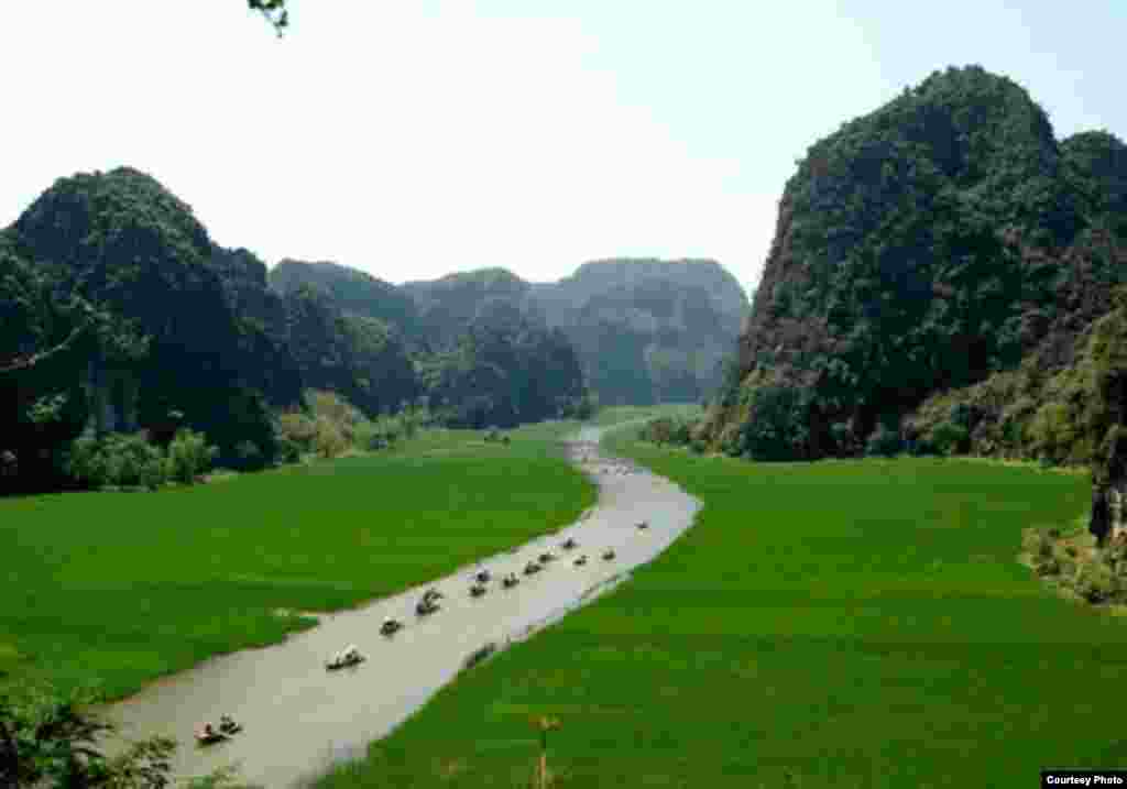 Trang An, in Vietnam, is a spectacular landscape of limestone karst peaks permeated with valleys, some of which are submerged, and surrounded by steep, almost vertical cliffs. (UNESCO)