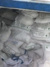 FILE - Sacks of ammonium perchlorate, a chemical commonly used to make missile fuel, are found on a fishing vessel intercepted by US naval forces in the Gulf of Oman in November 2022. 