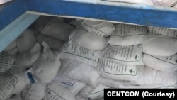 FILE - Sacks of ammonium perchlorate, a chemical commonly used to make missile fuel, are found on a fishing vessel intercepted by US naval forces in the Gulf of Oman in November 2022. 
