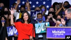 Boston Mayor-elect Michelle Wu greets supporters at her election night party, Nov. 2, 2021, in Boston. 