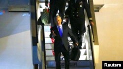 FILE - U.S. Secretary of Defense Jim Mattis reacts as he disembarks from his plane in a June 4, 2017, photo. Mattis will be spending much of the coming week in Asia, first attending a defense ministers meeting in the Philippines and then traveling on to South Korea and Thailand.