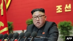 北韓最高領導人金正恩在第八屆勞動黨代表大會上講話。