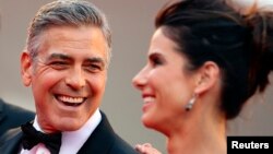 George Clooney y Sandra Bullock estrenaron el festival con la cinta Gravity.