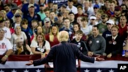 FILE - Republican presidential candidate Donald Trump speaks at a rally at Valdosta State University in Valdosta, Ga., Monday, Feb. 29, 2016.