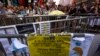 A message left by anti-Occupy protesters is displayed on Nathan Road recaptured by pro-democracy protesters at Mongkok shopping district in Hong Kong, Oct. 20, 2014. 