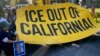 Para aktivis imigrasi menggelar unjuk rasa di Sacramento, California, Senin, 2 Desember 2024, memprotes rencana Presiden Terpilih Donald Trump untuk melakukan deportasi massal terhadap imigran tanpa status legal. (Haven Daley/AP)