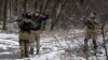 France, Germany Threaten New Sanctions Over Ukraine