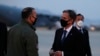 U.S. Secretary of State Antony Blinken talks with Lt. Gen. Scott Pleus, deputy commander of U.S. Forces Korea, before he boards a plane at the Osan Air Base in Pyeongtaek, South Korea, March 18, 2021.