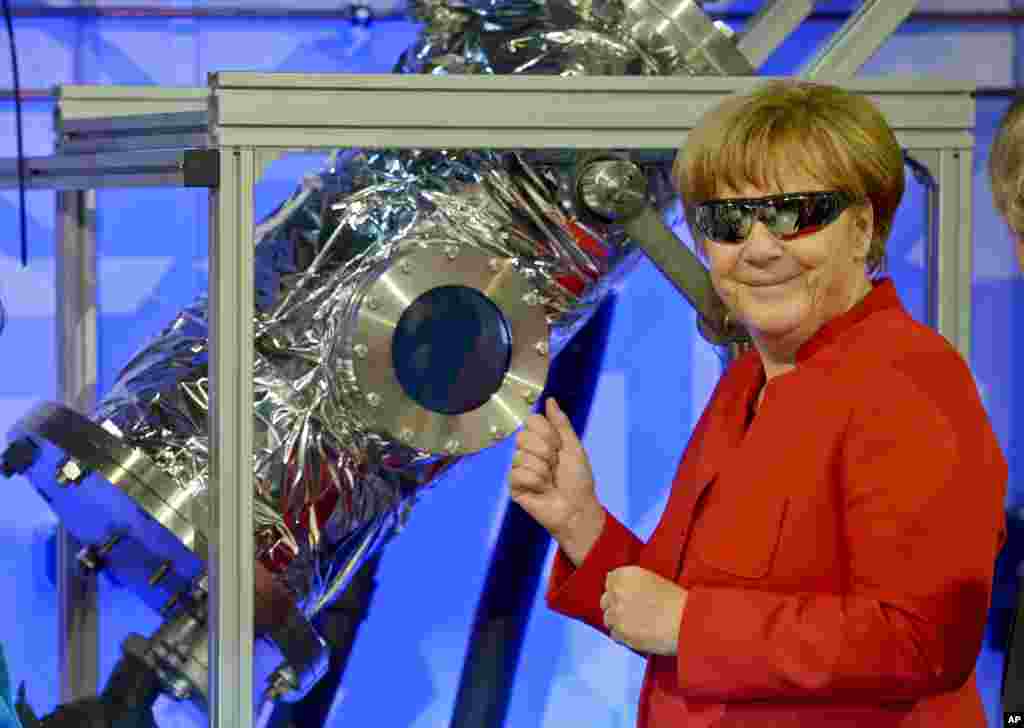 German Chancellor Angela Merkel visits the European Astronaut Center of the European Space Agency, in Cologne.