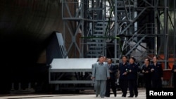 Kim Jong Un visits a submarine factory