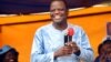L'homme d'affaire Sébastien Ajavon, soutient le candidat Patrice Talon, à Cotonou, le 18 mars 2016.
