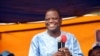 L'homme d'affaire Sébastien Ajavon, soutient le candidat Talon, à Cotonou, le 18 mars 2016.