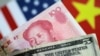 Le taux pivot du yuan s'est évalué à 6,9996 pour un dollar, en repli de 0,44% par rapport à mardi. (REUTERS/Thomas White/Illustration/File Photo)