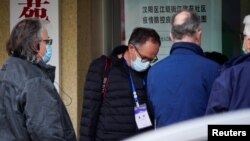 世衛組織新冠病毒源頭調查組成員星期四視察武漢漢陽區江欣苑社區。 （2021年2月3日）