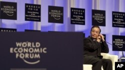 溫家寶2011年9月14日出席大連主辦的世界經濟論壇。(資料照片)
