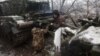 Ukrainian tank crews take part in a military drill not far from the front line in the Bakhmut direction, in the Donetsk region, on December 15, 2023, amid the Russian invasion of Ukraine.