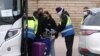 British Health Officials Lower National COVID-19 Alert from Level 5 to 4