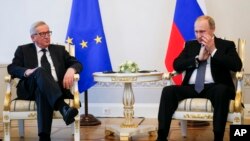 Arxiv surat. Rossiya Prezidenti Vladimir Putin va Yevropa Komissiyasi Prezidenti Jan-Klod Yunker Sankt-Peterburgda, 16-iyun, 2016-yil