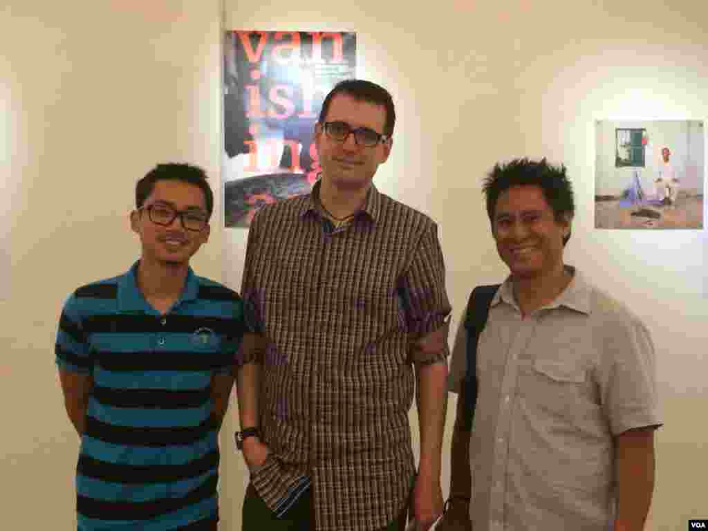 Author Ryun Patterson and photographer Rick Valenzuela posed with a Cambodian student who helped with the translation of the ‘Vanishing Act’.