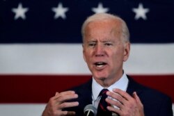 FILE - Democratic presidential candidate former Vice President Joe Biden gestures during a campaign stop in Manchester, N.H., Oct. 9, 2019.
