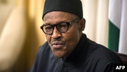 FILE - Nigerian president Muhammadu Buhari gives an interview to Agence France-presse at his hotel during the 25th African Summit.