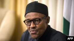 Nigerian president Muhammadu Buhari gives an interview to Agence France-presse at his hotel during the 25th African Summit on June 14, 2015 in Johannesburg. 