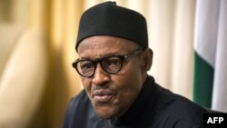 FILE - Nigerian President Muhammadu Buhari gives an interview to AFP at his hotel during the 25th African Summit in Johannesburg, June 14, 2015. 