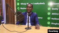 FILE - Somali journalist Abdalle Ahmed Mumin is seen at work in a broadcast studio. (Courtesy - Abdalle Ahmed Mumin)