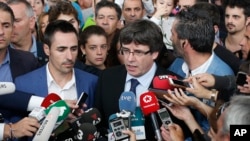 Le président séparatiste catalan Carles Puigdemont lors d’un point de presse à Saint-Julia de Ramis, près de Girona, Espagne, 1er octobre 2017.