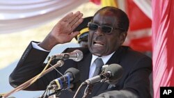 Zimbabwean President Robert Mugabe addresses supporters in Harare, July, 20 2011