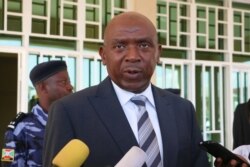 Agathon Rwasa, presidential candidate of Burundi's main opposition party the National Congress for Liberty, speaks to media after filing a petition against the election results at the constitutional court in Bujumbura, May 28, 2020.