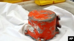 This photo provided by by the French air accident investigation authority BEA on Saturday, March 16, 2019, shows the cockpit voice recorder from the crashed Ethiopian Airlines jet, in le Bourget, north of Paris.