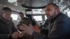 Міністр оборони України Рустем Умєров у БТРі під час візиту до прифронтового міста Куп'янськ, 30 листопада 2023 року. Фото AP
